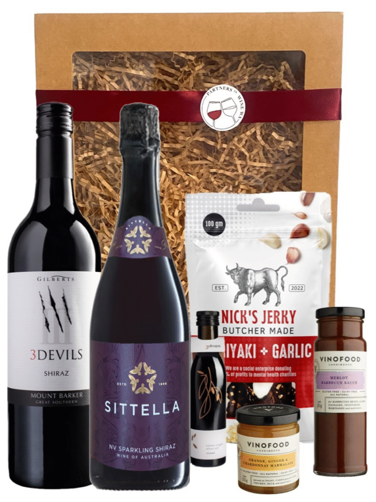 Red wine gift box featuring Gilberts 3 devils shiraz & Sittella Sparkling shiraz wine bottles, with a ribbon and partners in wine wa sticker